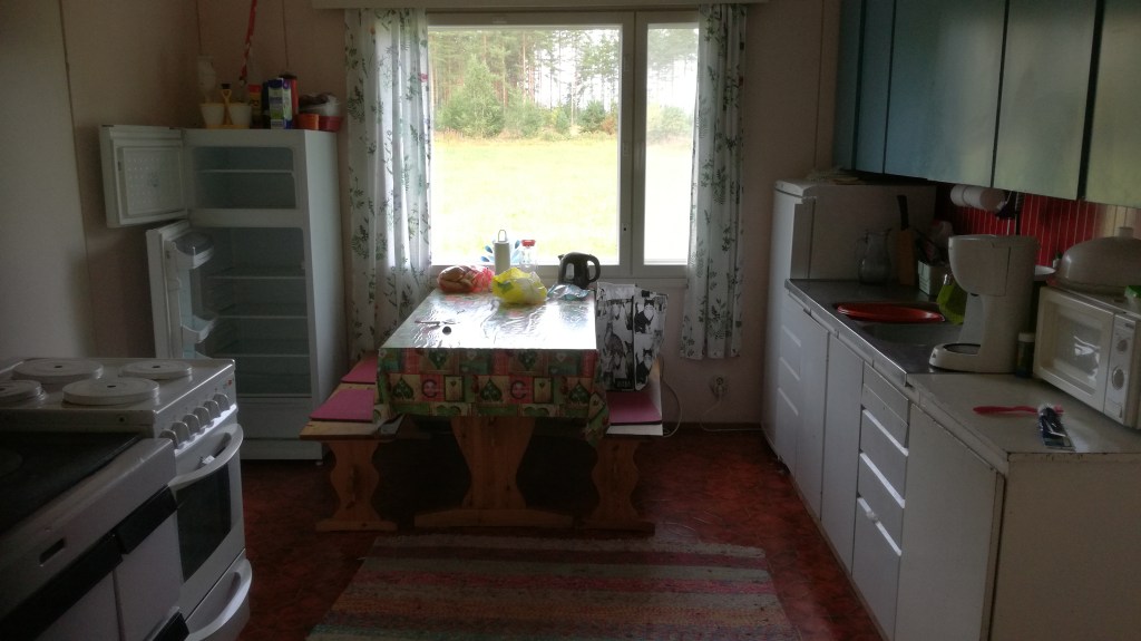 Old fashioned country kitchen in Finland. In the left corner wood burning stove, been there since 60's
